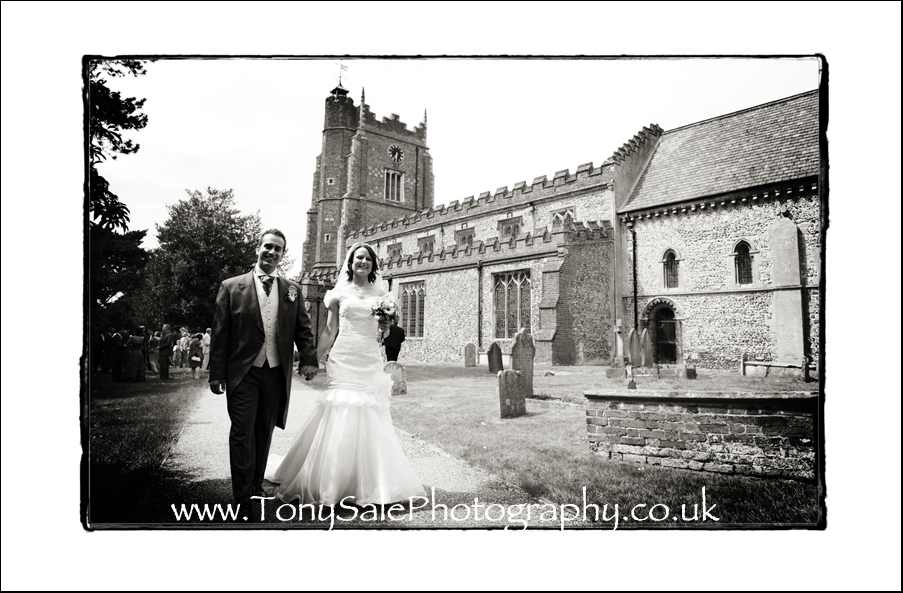 Black and white photograph of the bride and groom St Nicholas 39s church 